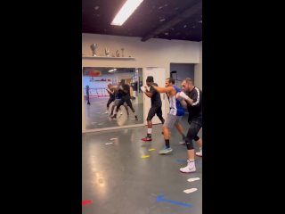 group training near the shadow boxing mirror